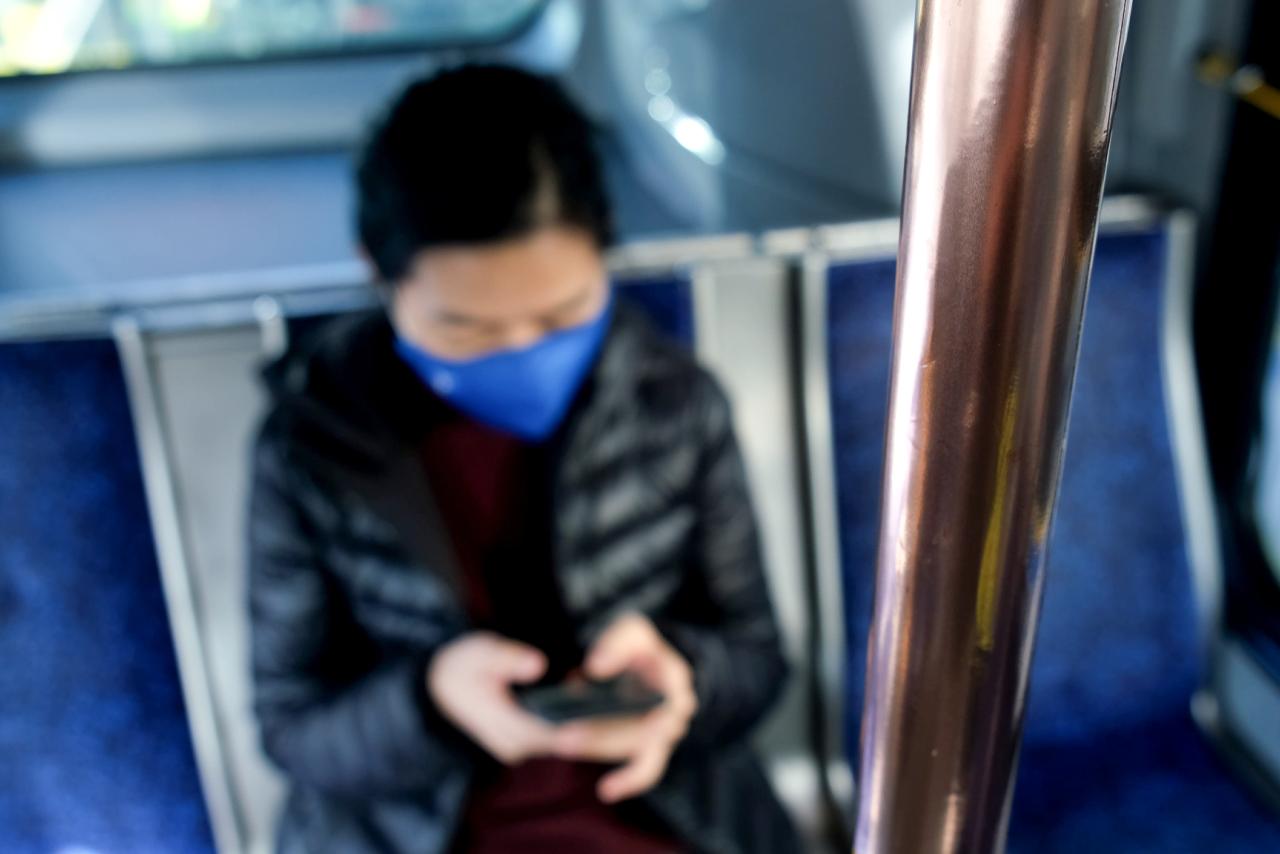 Close up of a copper pole inside a bus