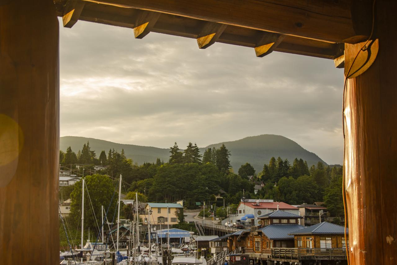 Gibsons marina in golden light framed by the pier