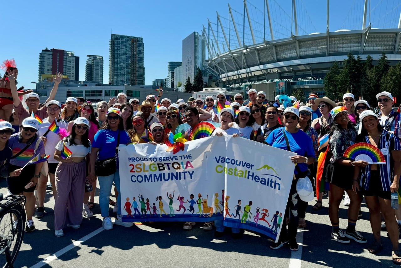 VCH employees posing for a group photo after the 2024 Vancouver pride parade