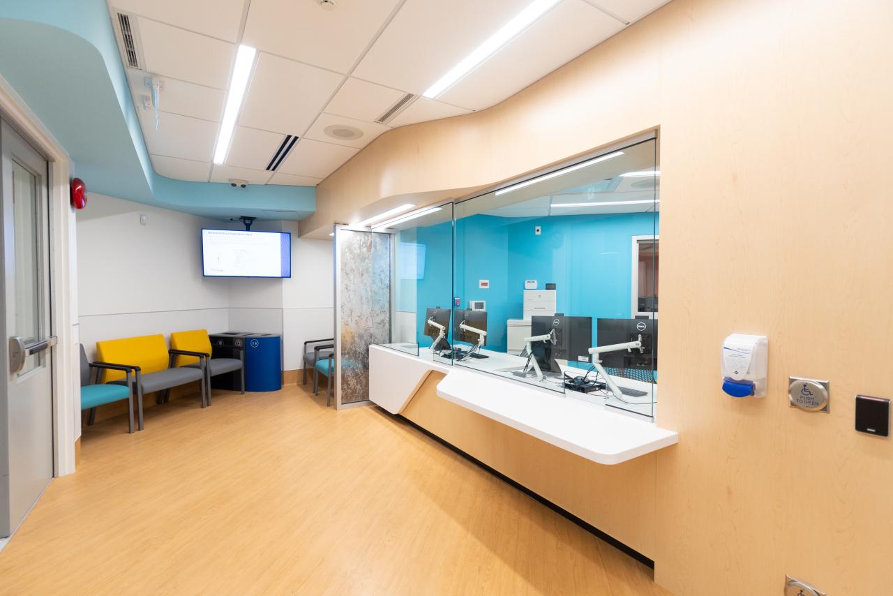 Reception area showing chairs and reception desk.