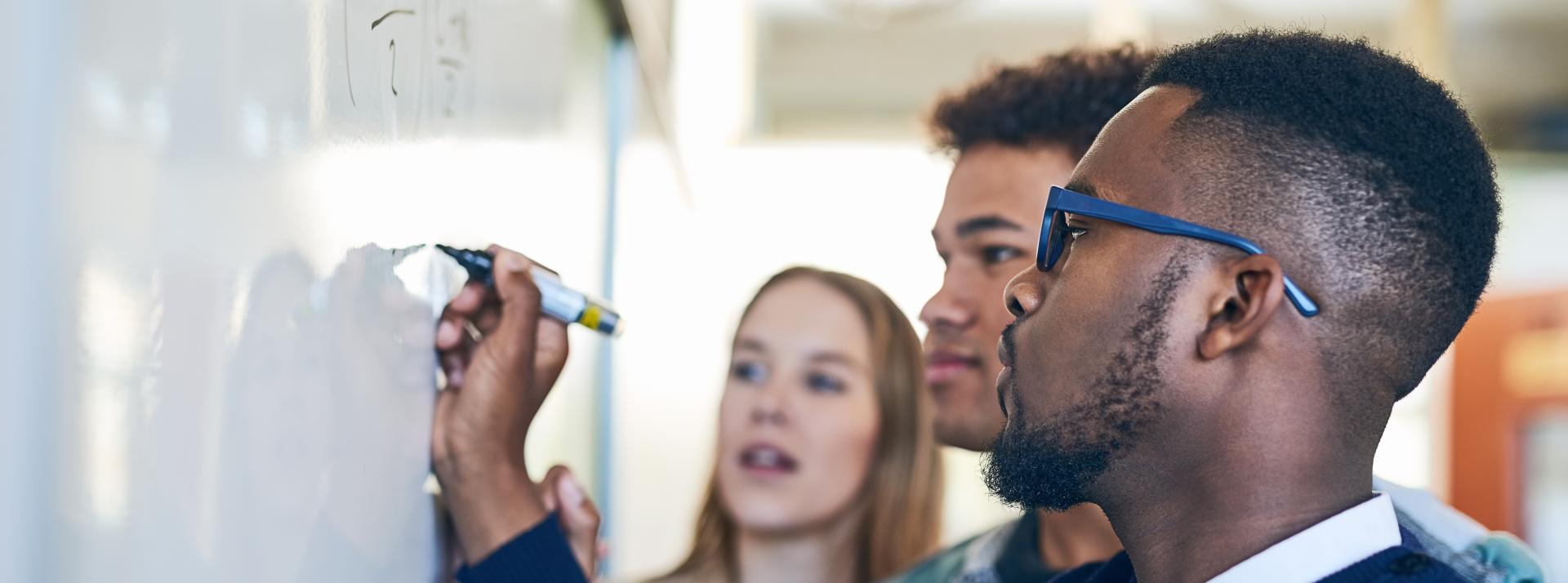 Innovation team at whiteboard