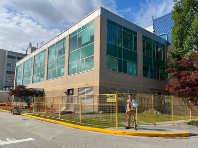 Steve standing in front of the future location of the UBC Faculty of Medicine Medical Education Centre at Richmond Hospital.