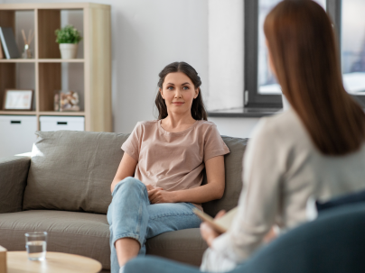 Stock image of patient with health care provider in an office setting