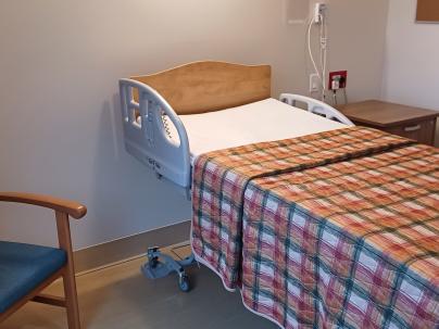 Bed in a private room inside Silverstone Hospice