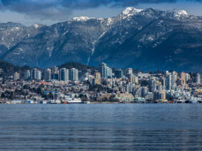 North Vancouver mountains against city skyline and water